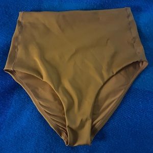 Left on Friday Hi Tide bottom in 24 karat in Large